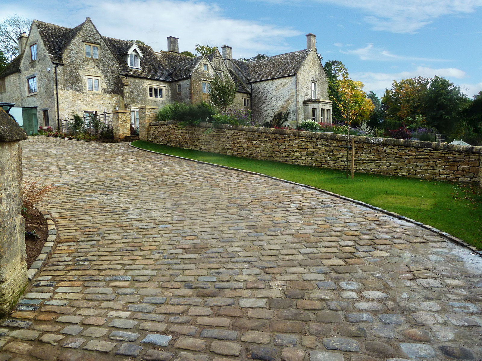 yorkstone setts for a custom driveway up to a house